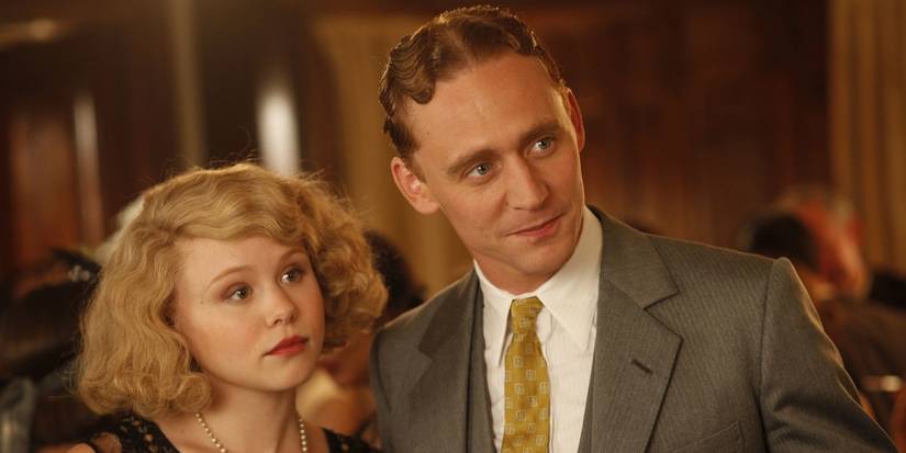 Zelda and Scott Fitzgerald smiling in Midnight in Paris