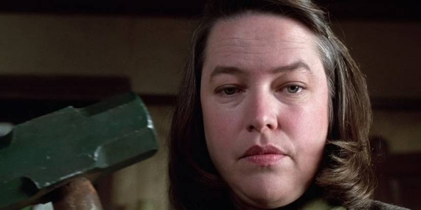 Annie Wilkes (Kathy Bates) holding a sledgehammer in Misery.