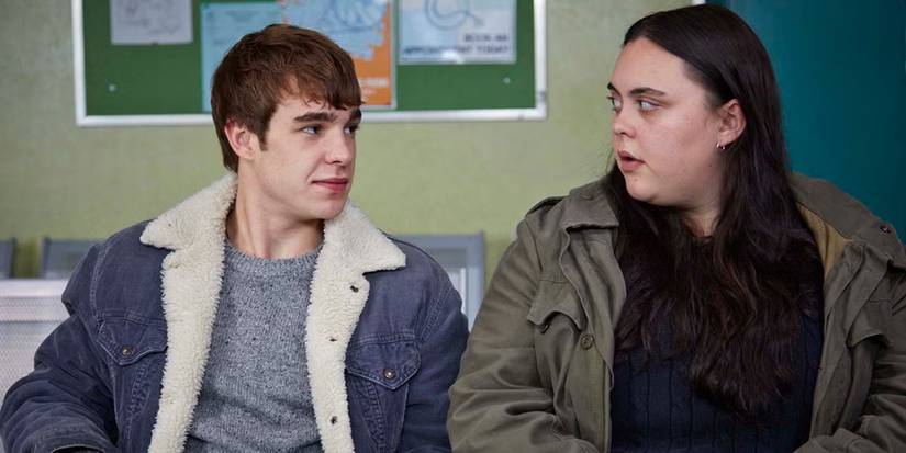 Nico Mirallegro as Finn and Sharon Rooney as Rae looking at each other in My Mad Fat Diary