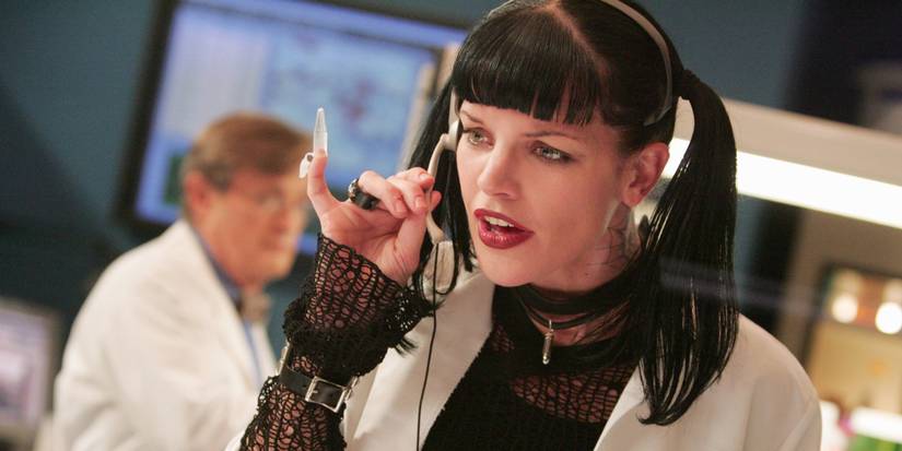 Pauley Perrette as Abby Sciuto talking on a headset on NCIS