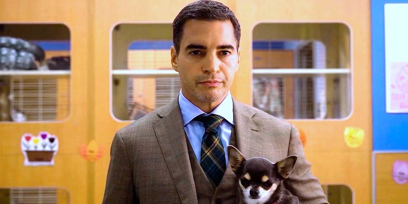 Ramon Rodriguez as Will Trent holding a chihuahua in 'Will Trent.'
