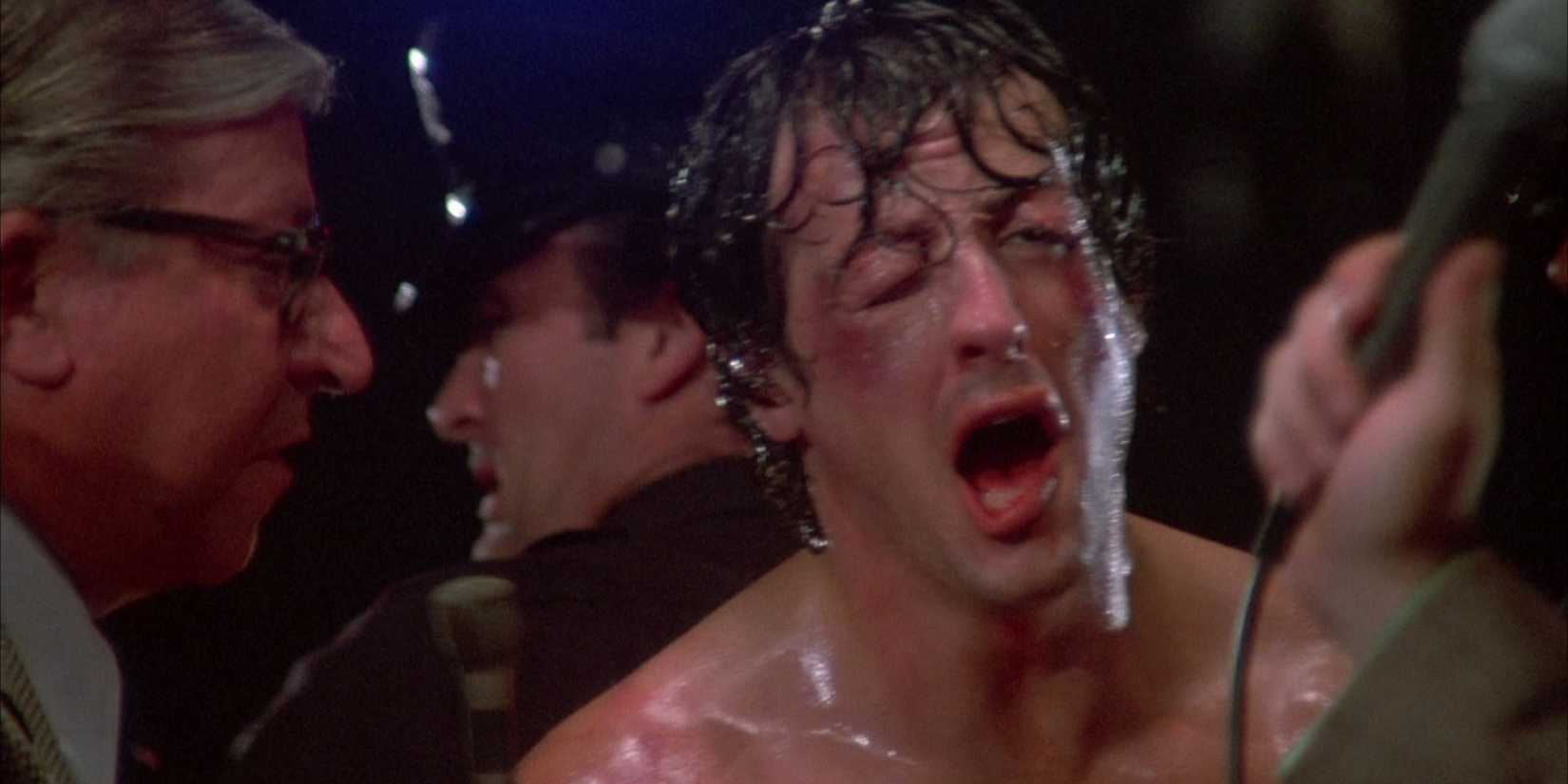 A bruised up Rocky (Sylvester Stallone) calls for Adrian (Talia Shire) in Rocky (1976)