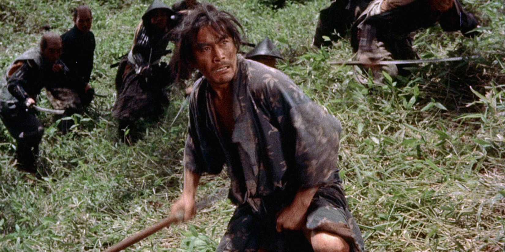 A samurai fighting enemies on a field in Samurai I: Musashi Miyamoto