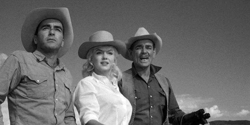 Montgomery Clift, Marilyn Monroe, and Clark Gable wearing cowboy hats in 'The Misfits'