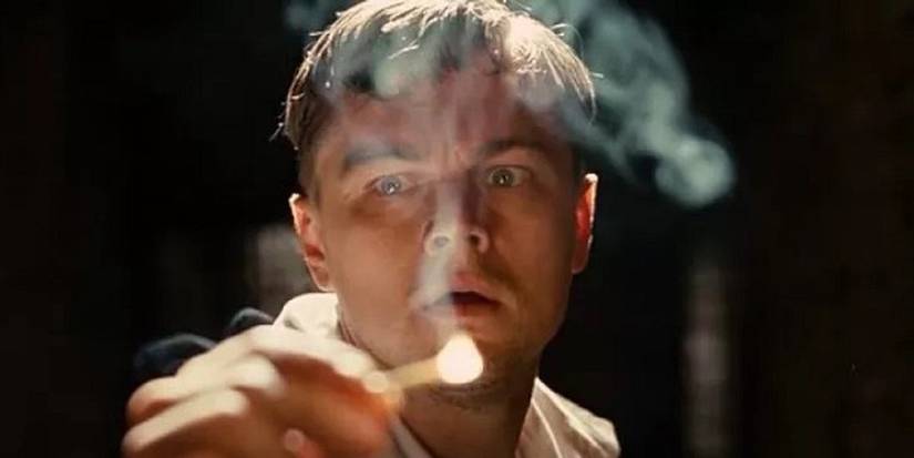 Leonardo DiCaprio as Teddy Daniels holding a flaming matchstick terrified in Martin Scorsese's 'Shutter Island'