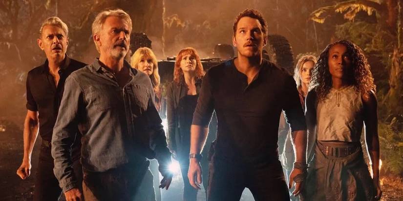 Old and new together as the cast looks up at something in 'Jurassic World Dominion'