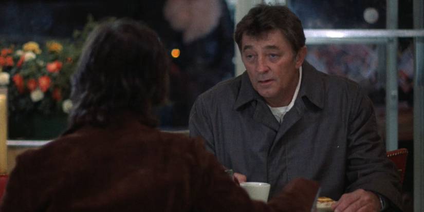 Eddie Coyle (Robert Mitchum) sits in a diner meeting with an ATF agent in 'The Friends of Eddie Coyle' (1973)