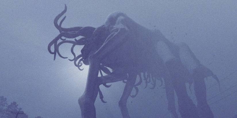 A large, Lovecraftian creature lumbers over the desolate town in 'The Mist'