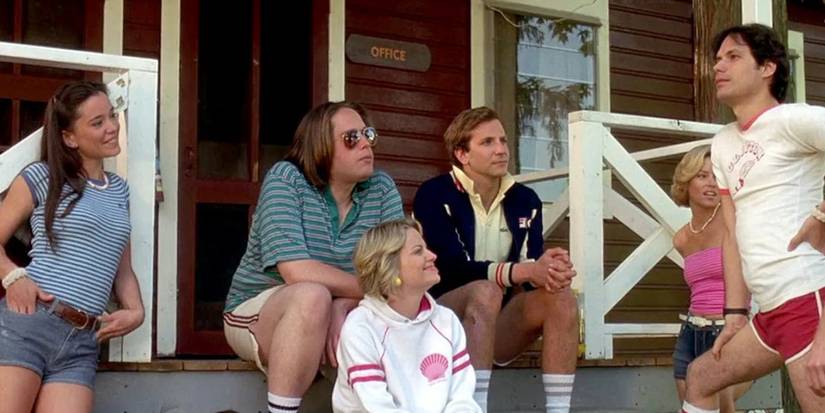 A group of people sitting on a porch in wet-hot-american-summer