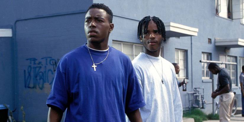 Two young Black men looking to the distance with confused expressions in Menace-II-Society