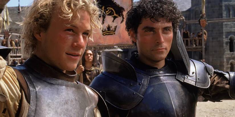 Health Ledger as William Thatcher and Rufus Sewell as Count Adhemar in the middle of a conversation in a Knight's Tale