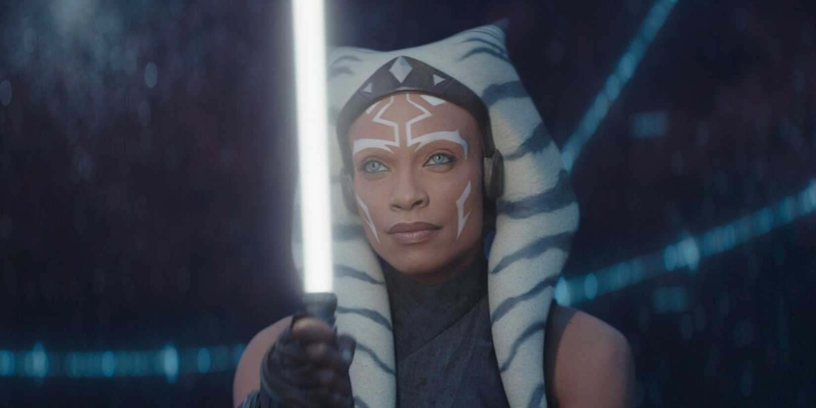 Ahsoka Tano holds a glowing white-bladed lightsaber in 'Ahsoka' on Disney+