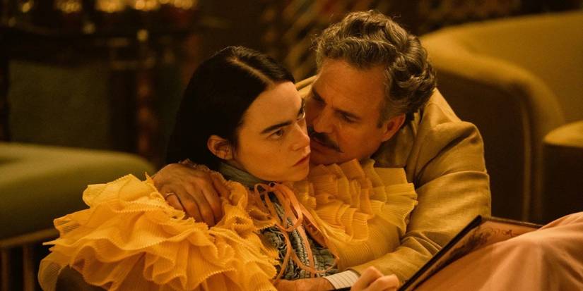 Duncan hugging an annoyed Bella in Poor Things