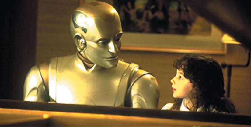 Robin Williams teaches a young girl to play piano in Bicentennial Man