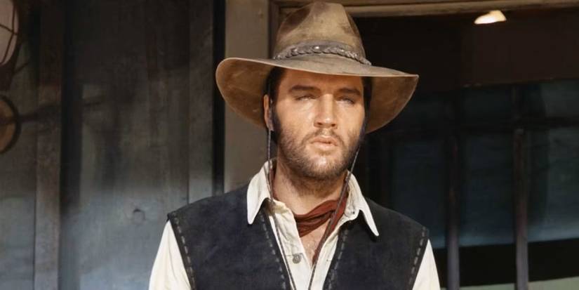 Elvis Presley as Jess Wade looking at person offscreen in Charro!