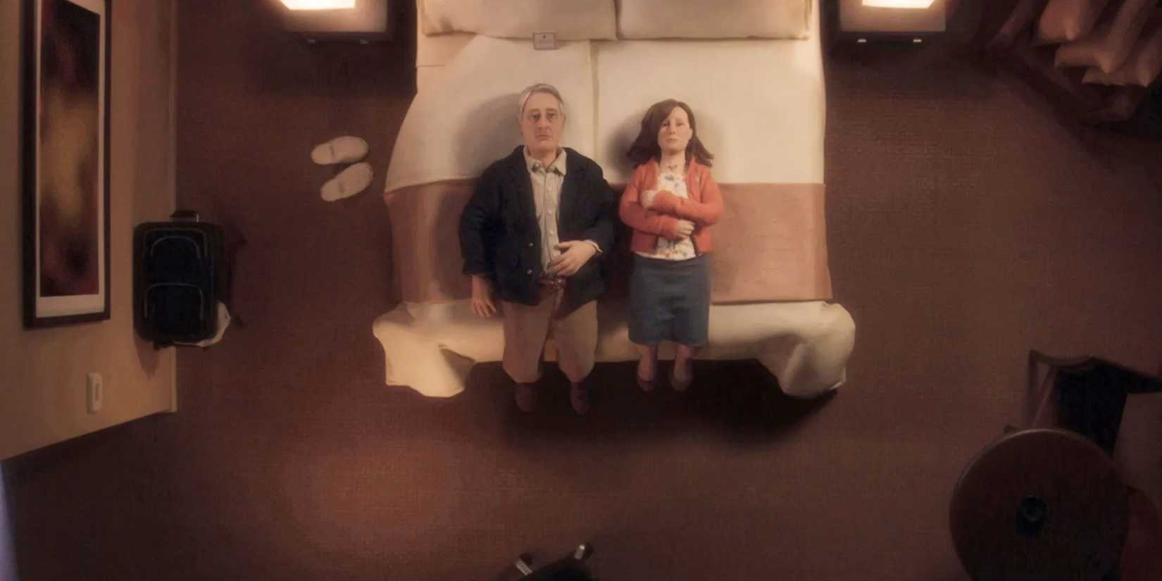 David Thewlis and Jennifer Jason Leigh lying on a bed in Anomalisa
