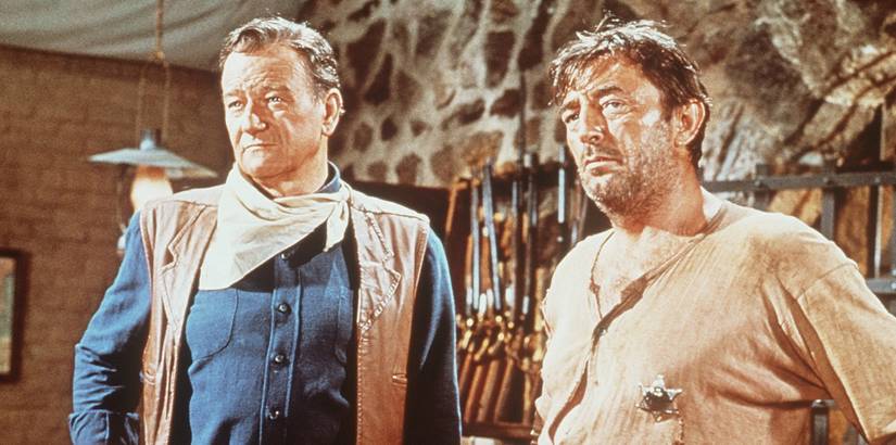 John Wayne as Cole Thornton and Robert Mitchum as Sheriff Harrah in El Dorado