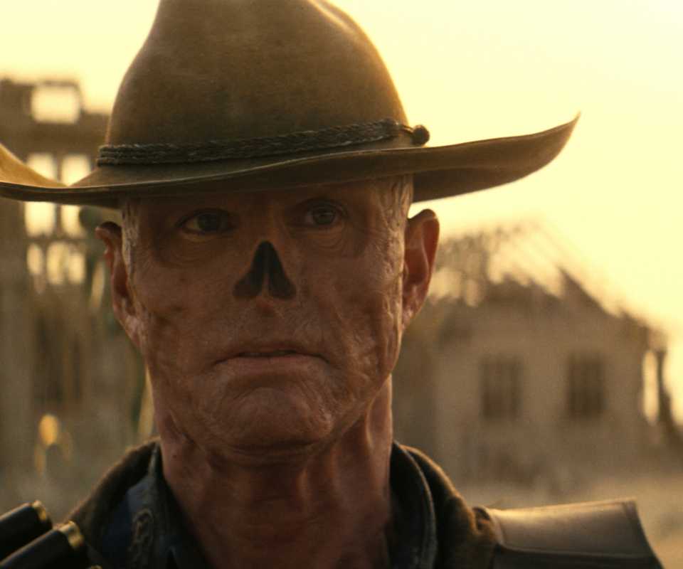 Walton Goggins as The Ghoul walking in the Wasteland in Prime Video's Fallout