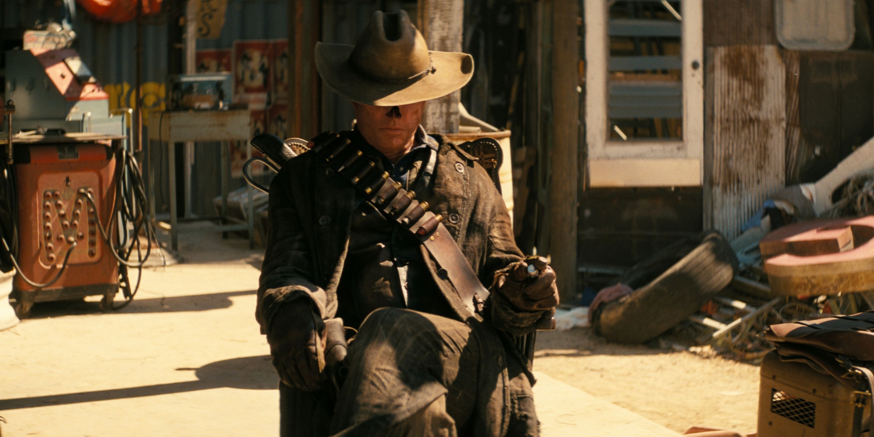 Walton Goggins as The Ghoul sitting with his head tipped down in Prime Video's 'Fallout'