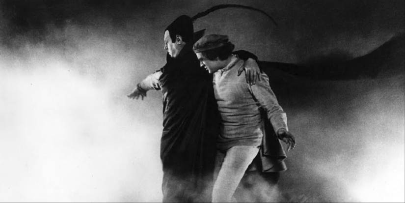 Faust leading a man through a misty space in Faust