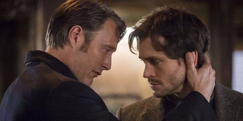 Hannibal Lecter (Mads Mikkelsen) embraces Will Graham (Hugh Dancy) in 'Hannibal' (2013-2015).