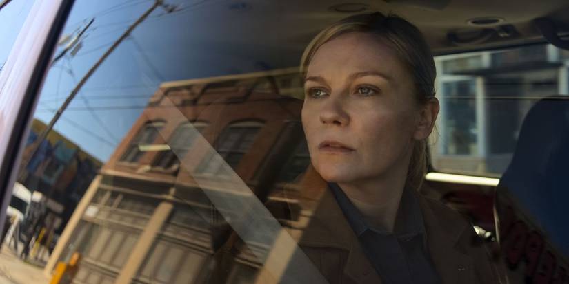 Lee Smith, staring out a car window, in Civil War.
