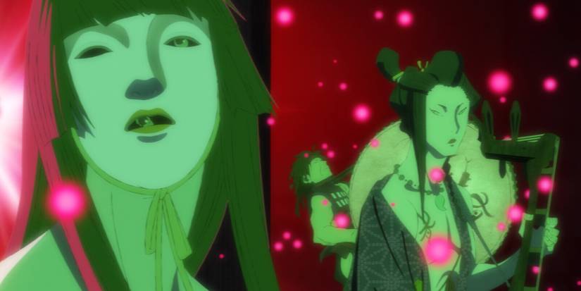 A still from Inu-Oh featuring a band performing live on stage in a colorful performance under a green light