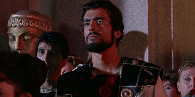 Jason (Todd Armstrong) stands amidst a crowd 