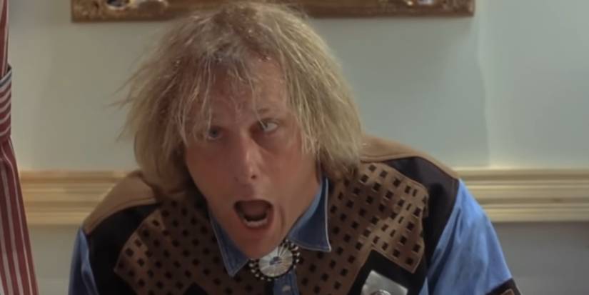 Harry Dunne (Jeff Daniels) suffering on the toilet in 'Dumb and Dumber'