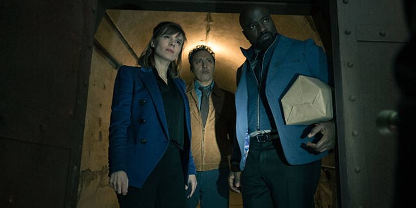 Katja Herbers, Aasif Mandvi and Mike Colter, in a tunnel looking at something suspiciously, as Dr. Kristen Bouchard,  Father David Acosta, and Ben Shakir in Evil Season 4