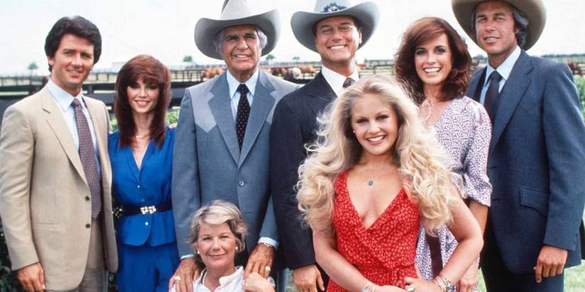 The cast of Dallas poses in character for a group photo.