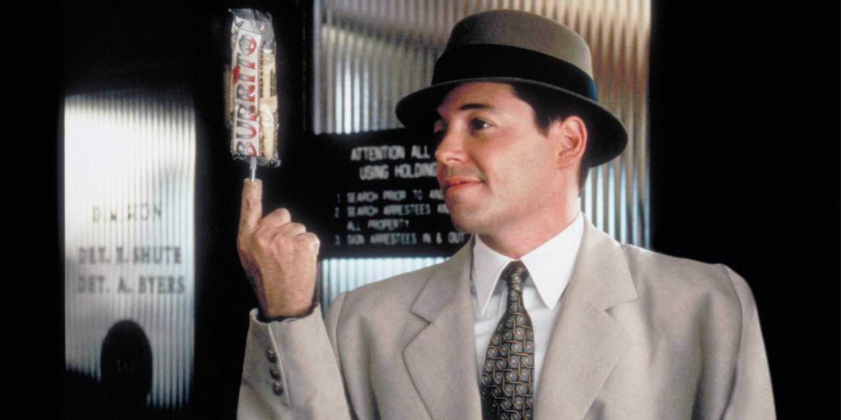 Matthew Broderick admiring a burrito on for a finger in Inspector Gadget (1999)