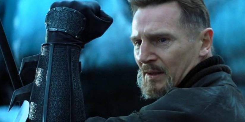 Ra's Al Ghul raises his bracer in a defensive position in Batman Begins