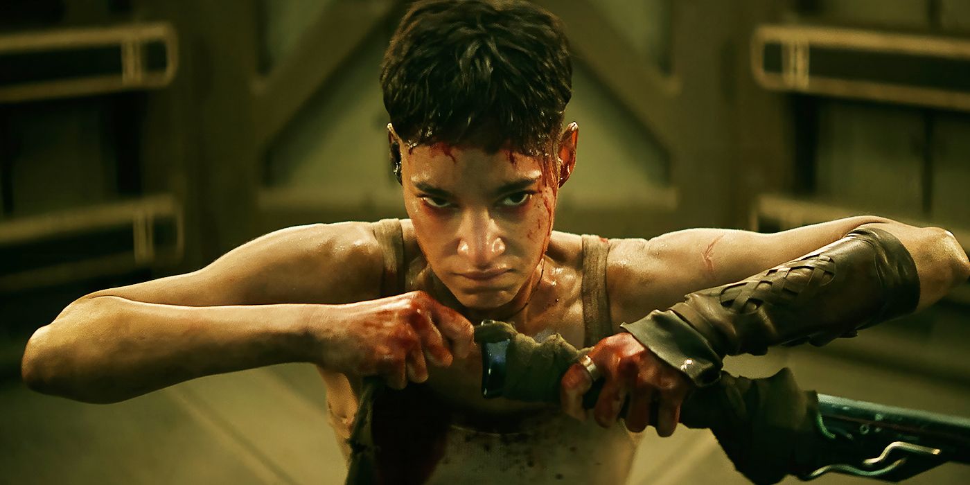Sofia Boutella as Kora covered in blood and preparing to fight Rebel Moon - Part Two: The Scargiver.