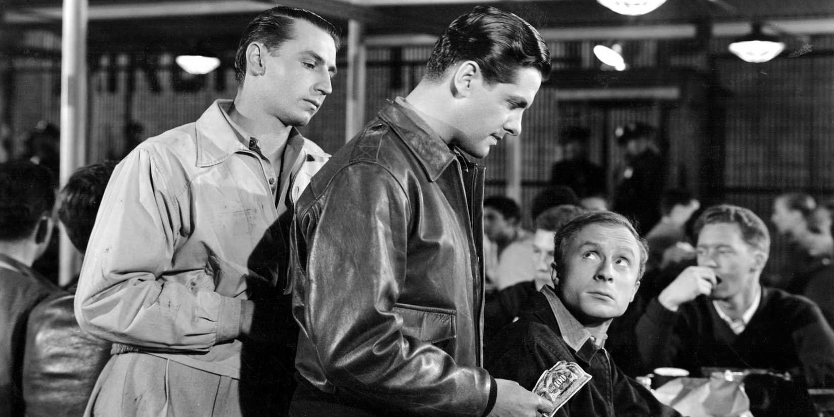 Robert Cummings, Norman Lloyd, and Virgil Summers in Saboteur (1942)