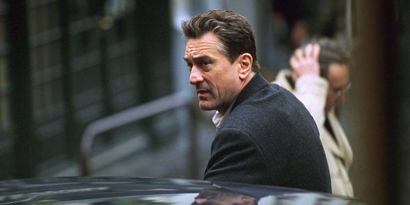Robert De Niro coming out of a car in Ronin