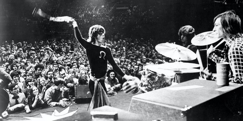 The Rolling Stones performing Gimme Shelter on stage