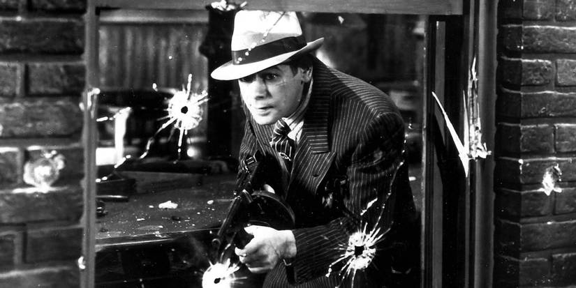 Tony Camonte firing a shotgun in Scarface