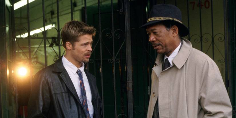 Brad Pitt as Mills and Morgan Freeman as Somerset having a conversation in David Fincher's Se7en.