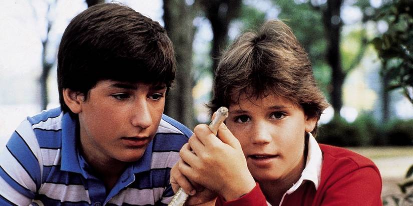 Joe Wright plays Brady Kincaid next to Corey Haim as Marty Coslaw looking at the camera in Silver Bullet