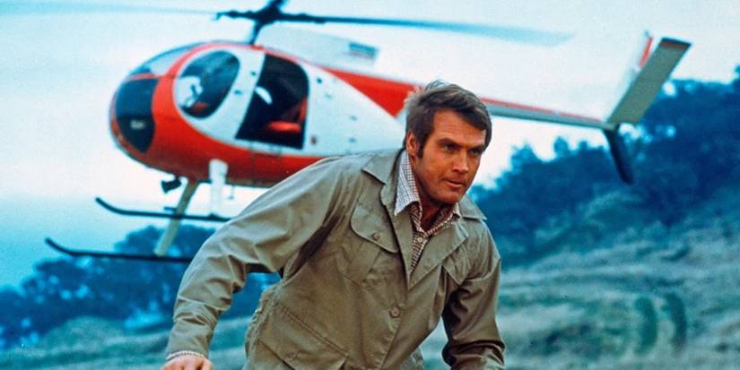 Steve Austin (Lee Majors) runs into action after being dropped off by a helicopter in 'The Six Million Dollar Man'