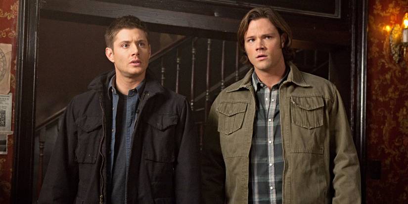 Jensen Ackles & Jared Padalecki as Dean & Sam Winchester looking confused in Bobby's house on Supernatural.