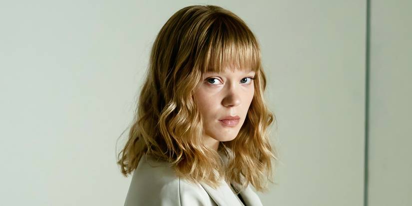 Léa Seydoux as Gabrielle Monnier looking at the camera in The Beast. 