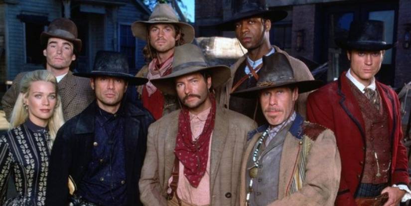 The cast of The Magnificent Seven TV series posing in western apparel. 