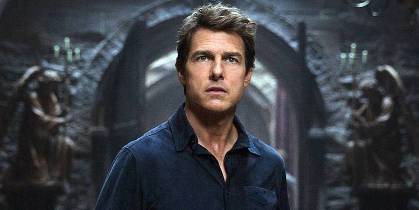 Tom Cruise as Nick Morton looking at a person offscreen in 2017's The Mummy.