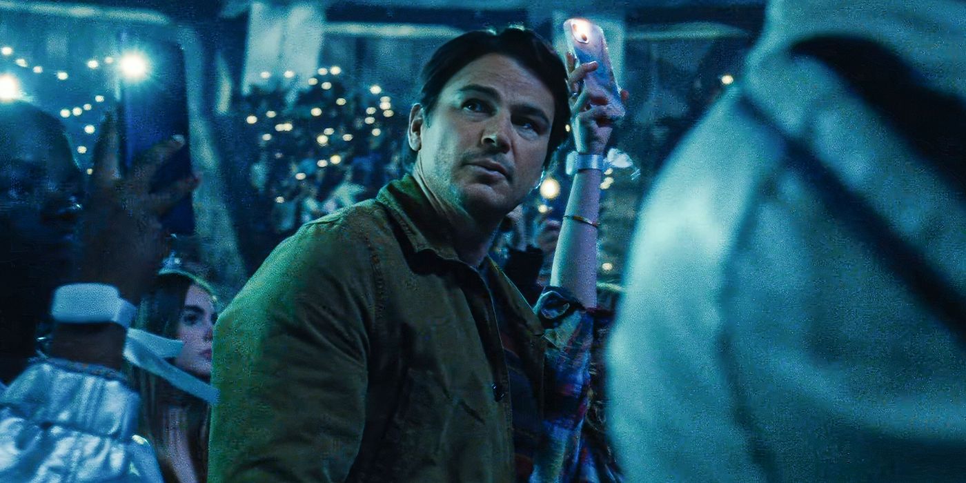 Josh Hartnett as Cooper standing in a crowd at a pop concert in M. Night Shyamalan's Trap