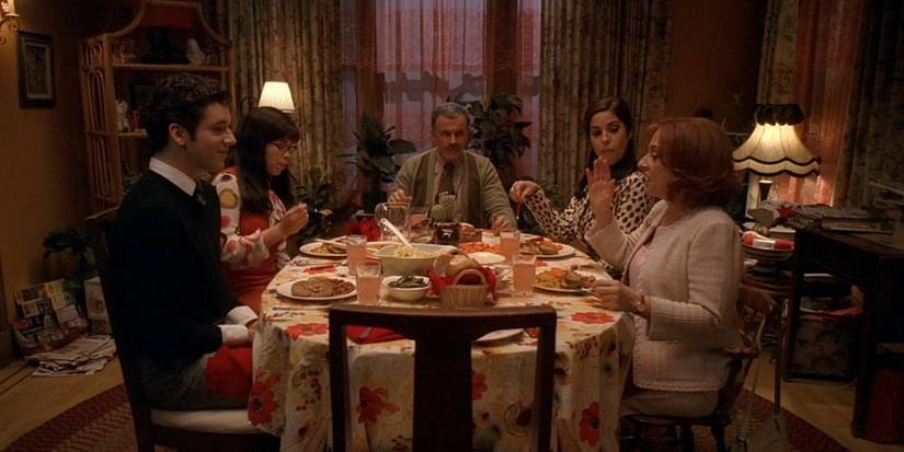Betty and Marc have dinner with Marc's mother, Ignacio, and Hilda. 
