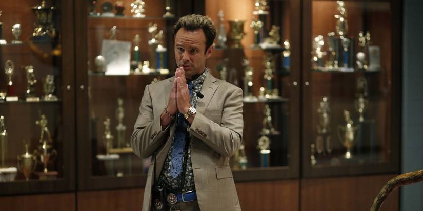 Walton Goggins as Lee Russell pleading in front of a trophy case in Vice Principals