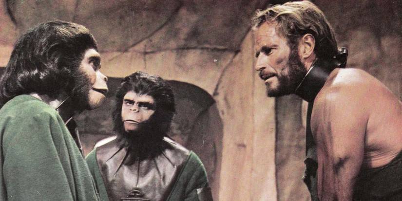 Dr. Zira (Kim Hunter), Cornelius (Roddy McDowall) and a shackled Taylor (Charlton Heston) in 'Planet of the Apes' (1968)