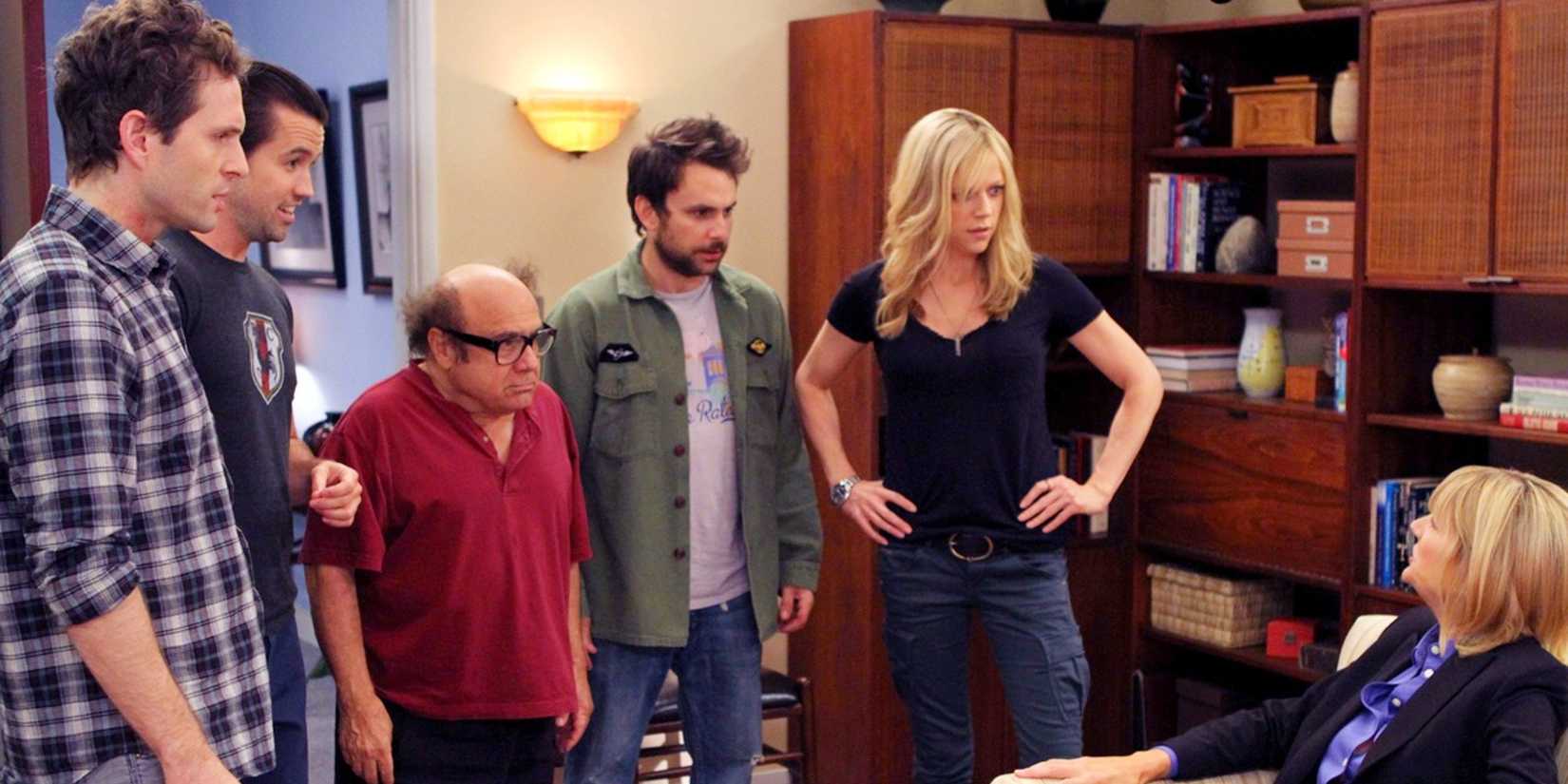 The cast stand together in a therapist's office in It's Always Sunny in Philadelphia. 